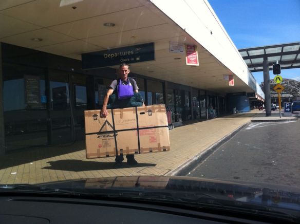 29er in a box at Sydney International Airport