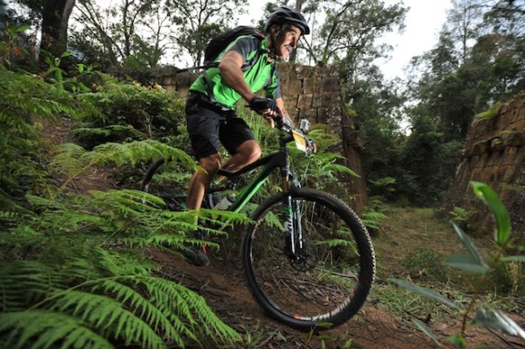 Clare's Bridge, built in the 1830s, can be seen behind this very focused rider