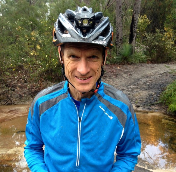 Paul - he gets so much pleasure from riding his bike he's not going to let a little bit of rain stand in his way!