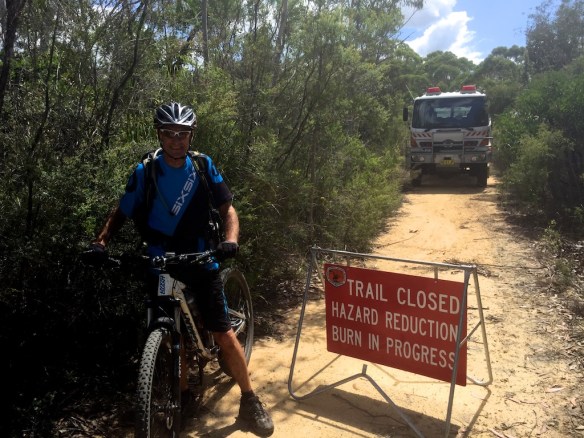 This sign and road block was set up way too late for us Central Coast keen riders. Our ride was out and back - all clear on the way out, and fire trucks plus helicopters dropping off big red bags of water everywhere on the way back!